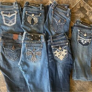 7 Pairs Of Women's Blue Jeans with Embellished Pockets Size 27.